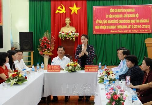 Partai dan Negara Vietnam selalu memperhatikan kebijakan terhadap orang-orang yang berjasa - ảnh 2