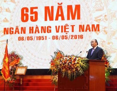 Primer ministro vietnamita honra contribuciones del Banco Estatal - ảnh 1