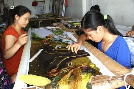Historia de la aldea de los bordados de Quat Dong en Hanoi - ảnh 1
