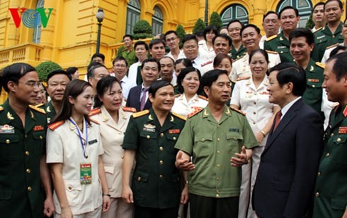ขยายผลตัวอย่างดีเด่นในกองทัพประชาชนและกองกำลังรักษาความมั่นคงทั่วไป - ảnh 1