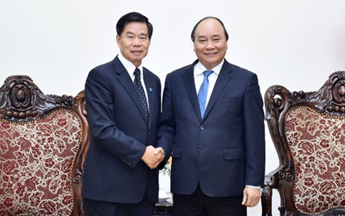 นายกรัฐมนตรีเวียดนามให้การต้อนรับเจ้าครองนครหลวงเวียงจันทน์และประธานกลุ่ม CapitalLand - ảnh 1
