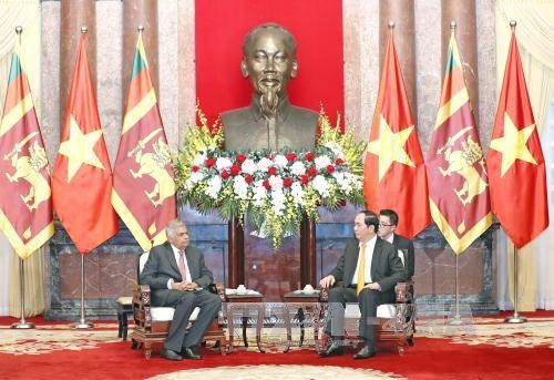 เลขาธิการใหญ่พรรคคอมมิวนิสต์เวียดนามและประธานประเทศเวียดนาม ให้การต้อนรับนายกรัฐมนตรีศรีลังกา - ảnh 2