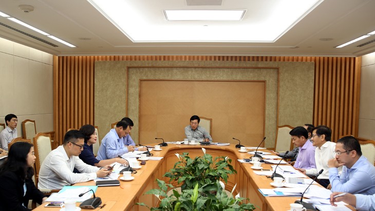 รองนายกรัฐมนตรี ฝ่ามบิ่งมิงห์ เป็นประธานการประชุมเกี่ยวกับการใช้เงินโอดีเอ - ảnh 1