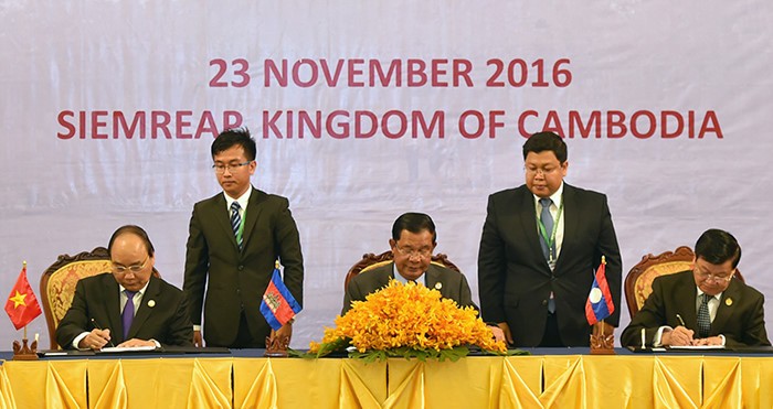 Déclaration commune du 9ème Sommet du Triangle de Développement CLV - ảnh 1