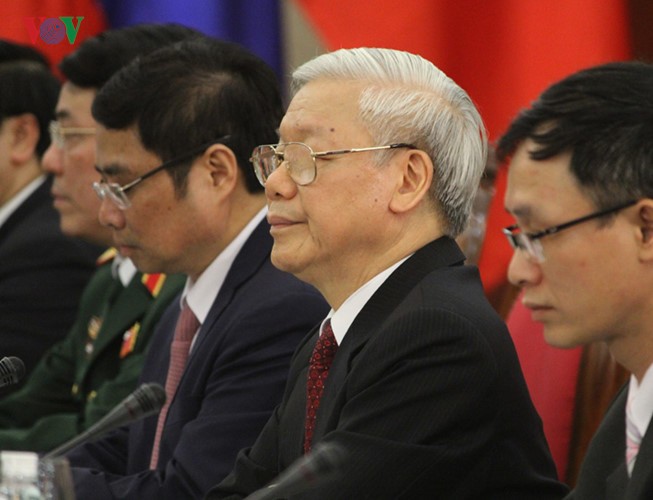 Lễ đón chính thức Tổng Bí thư, Chủ tịch nước Lào tại Hà Nội - ảnh 11