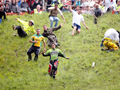 Thrills and spills at UK’s cheese rolling race