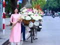 Ao dai beautifies Hanoi streets during autumn days		