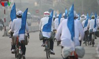 Elderly bicyclists support Vote for Ha Long Bay Campaign