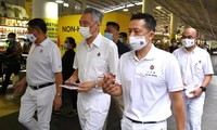 Les Singapouriens votent sous strict contrôle sanitaire