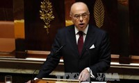 France's new PM Bernard Cazeneuve wins confidence vote