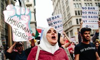 Supreme Court justices temporarily preserve Trump’s refugee ban