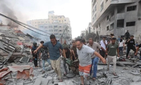 Middle East tensions rise as airstrikes hit Gaza, killing at least 100