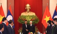 Sekjen, Presiden Laos, Bounnhang Vorachith mengakhiri dengan baik kunjungan persahabatan resmi di Vietnam