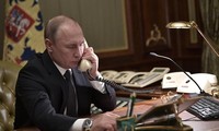 Putin, Merkel and Macron discuss hot issues by phone