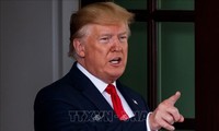 Trump urges China not to delay trade deal