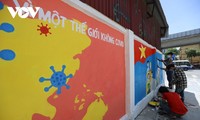 Murals on COVID-19 prevention hit Hanoi street