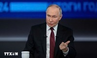 Putin sees 'light at end of the tunnel' in Russia-US ties