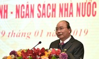 PM Nguyen Xuan Phuc menghadiri konferensi evaluasi instansi keuangan