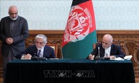 NATO, dan AS menyambut baik permufakatan pembagian kekuasaan di Afghanistan