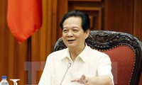 Prime Minister Nguyen Tan Dung urges to ensure macro economy, currency stability