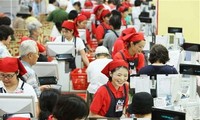 Japan postpones sales tax until 2019