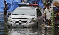 Typhoon Nock-Ten kills four in the Philippines