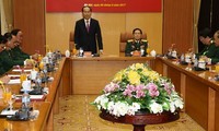 President Tran Dai Quang works with Defense Ministry leaders