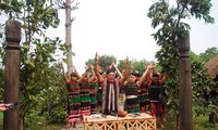 M’Nong people’s village gate worship ritual