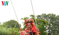 Swinging, an indispensable game of the Ha Nhi's rain Festival