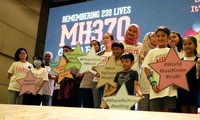 Nine years on, families urge new search for missing Malaysia plane MH370