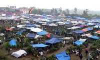 Le Vieng, marché de la sollicitation du bonheur