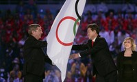 Le drapeau olympique vers la Corée