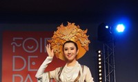 Présenter la tunique traditionnelle vietnamienne au monde