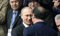 Ukraine: Hollande, Merkel, Poutine et Porochenko pour une "mise en oeuvre complète du cessez-le-feu"