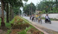 Kecamatan Ta Thanh Oai dengan kesan tentangPresiden Ho Chi Minh menciduk air di pesawahan Quai Chao