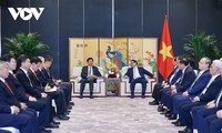 PM Pham Minh Chinh Menerima Ketua Daerah Otonomi Suku Zhuang Guangxi, Tiongkok