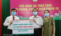 Vietnamitas continúan aportando al Fondo de Vacunas contra el coronavirus