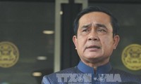 Pemerintah Thailand  menenangkan  massa rakyat dan komunitas  internasional