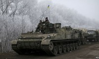 Both sides in Ukraine observe cease-fire, although shelling continues