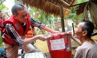 OVs make donations to help flood victims in central region