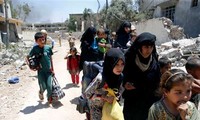 Irak: Des milliers de personnes sont retenues à Mossoul