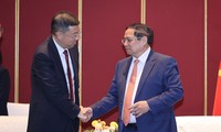 范明政建议中国顶级银行参与越南国际金融中心建设
