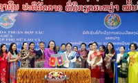 Frauenunionen Vietnams und Laos verstärken ihre Zusammenarbeit