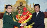 Tentara Laos berjanji bahu-membahu dengan tentara Vietnam untuk membela hubungan dua negara.