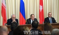 Russia, Iran, and Turkey vow to speed up ceasefire in Syria