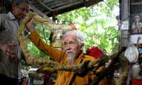 Local elderly man with five-metre long hair among strangest photos of the year