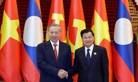 Tổng Bí thư, Chủ tịch nước Lào và Phu nhân thăm cấp Nhà nước tới Việt Nam