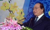 Deputy PM Vietnam nguyen Xuan Phuc mengucapkan hari raya Tet kepada Grup perlistrikan Vietnam