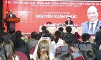 PM Nguyen Xuan Phuc melakukan pertemuan dengan komunitas orang Vietnam di Federasi Rusia