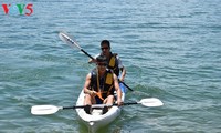  Lomba mendayung perahu Kayak di danau Phu Ninh